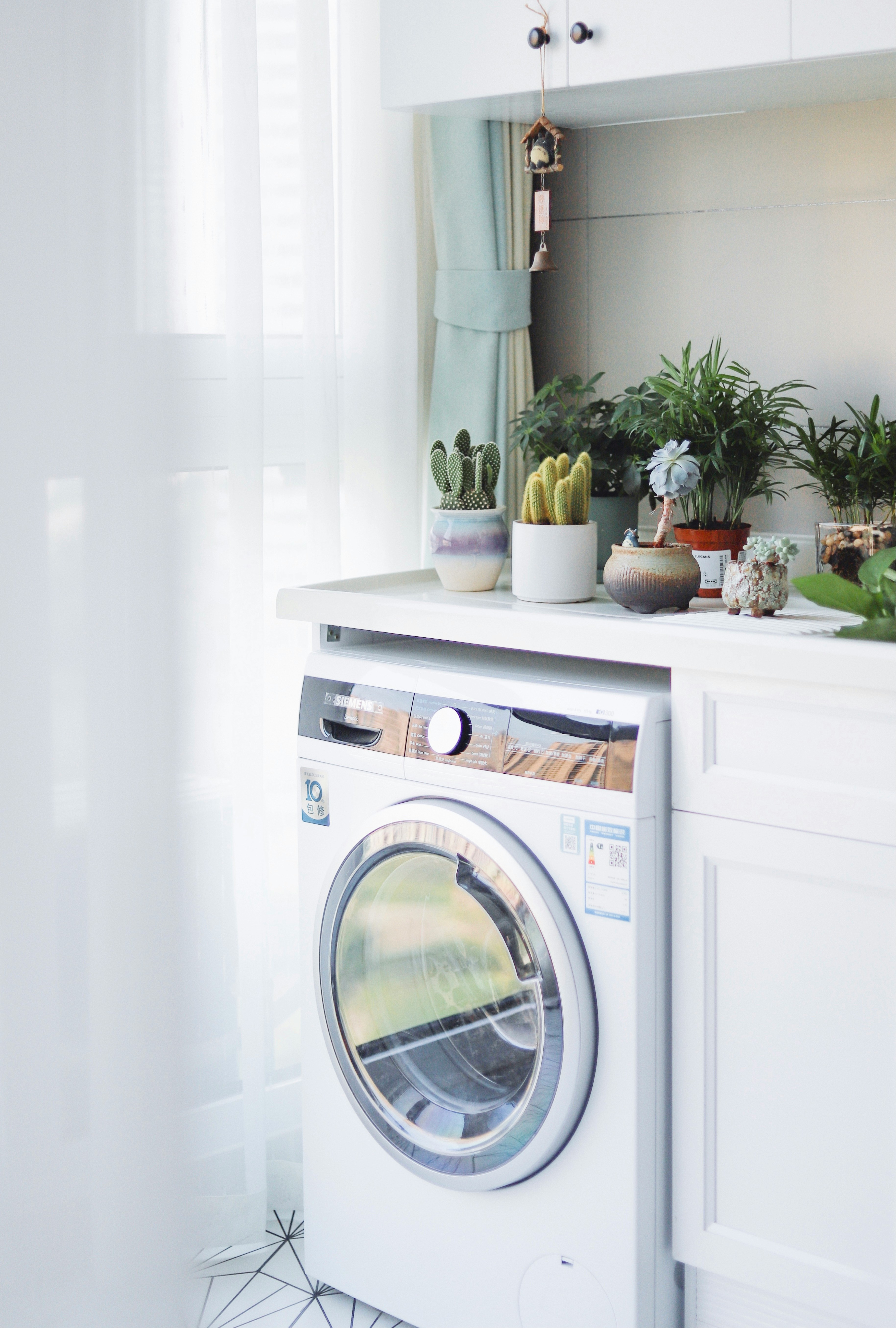 Bright laundry space with front-load dryer